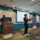 Christopher, SAMENTA Digitalisation and AI Director, speaking at SAMENTA Hyperlokal AI Fest at Microsoft KL