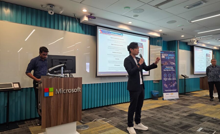 Christopher, SAMENTA Digitalisation and AI Director, speaking at SAMENTA Hyperlokal AI Fest at Microsoft KL