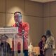 YB Datuk Chang Lih Kang, Minister of Science, Technology and Innovation, speaking at the MITEC lectern during the officiating address at RetailTech+ 2026, The Future of Retail Forum