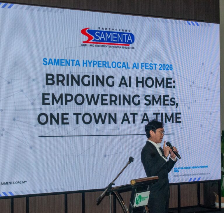 SAMENTA Hyperlokal AI Fest 2026 Kuching Chapter stage screen - bringing AI home, empowering SMEs, one town at a time